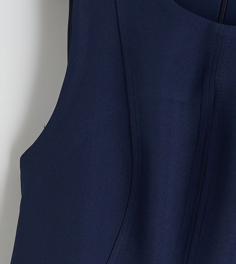 Solid Sleeveless Peplum Dress