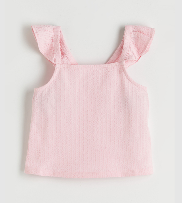 طقم توب كم كشكش بطبعة ورود وتنورة