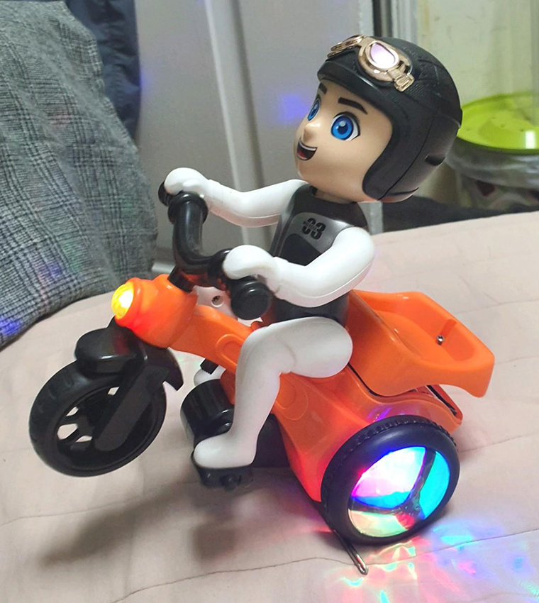 Stunt 360 Rotating Bicycle Toy Bump & Go Tricycle with Flashing Light & Sound - Orange