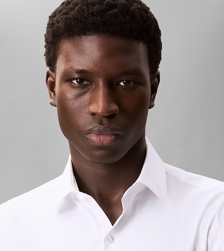 قميص سادة كم طويل بقصة ضيقة