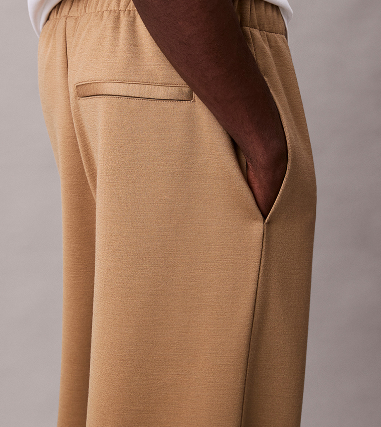 بنطلون رياضة سادة بخصر مرن 