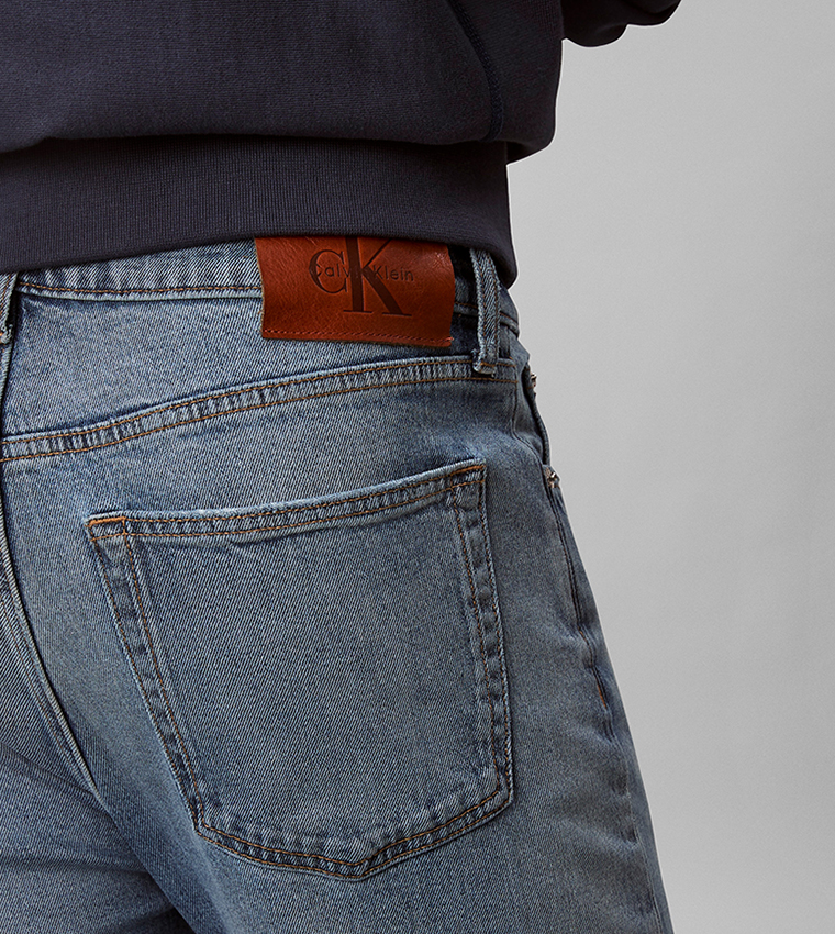 Washed Mid Rise Straight Fit Jeans