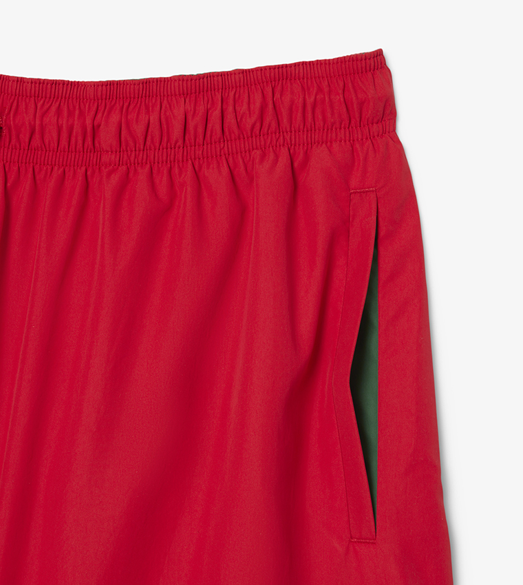 شورت سباحة بشعار ورباط 