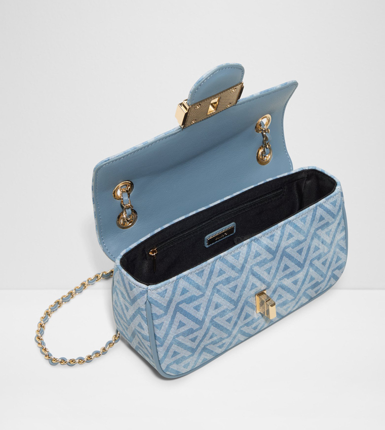 شنطة كروس بادي بنقشة مونوغرام 