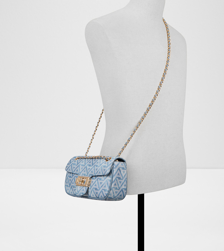 شنطة كروس بادي بنقشة مونوغرام 