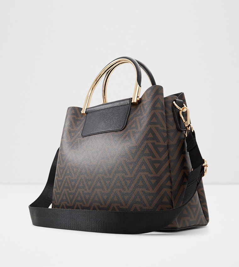 شنطة يد بنقشة مونوغرام 