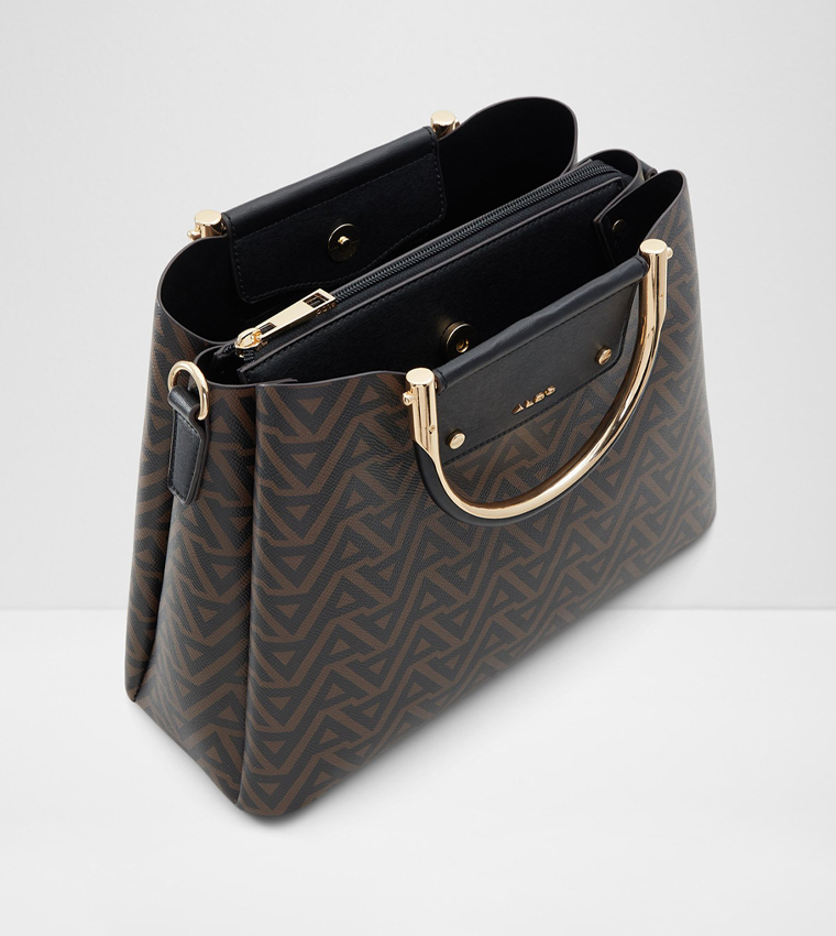 شنطة يد بنقشة مونوغرام 