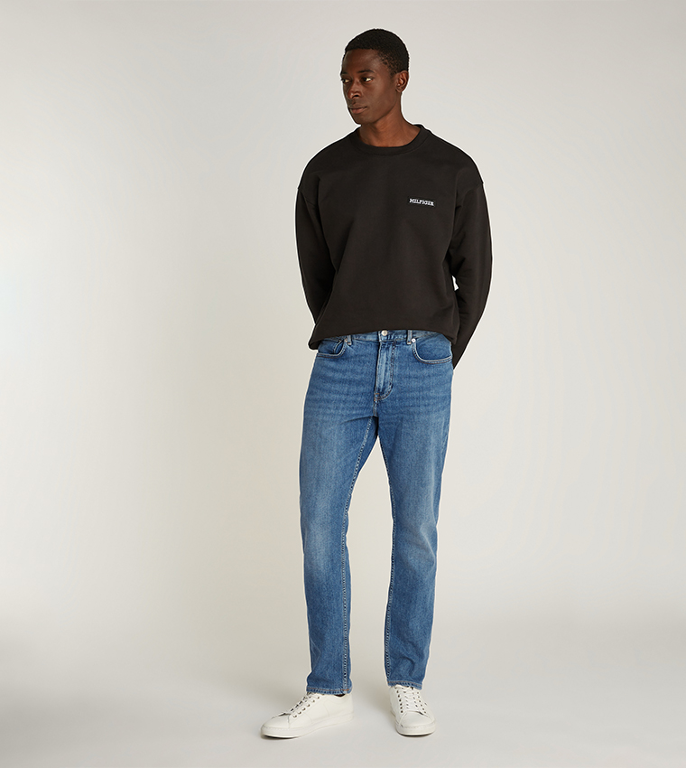 Washed Mid Rise Tapered Fit Jeans