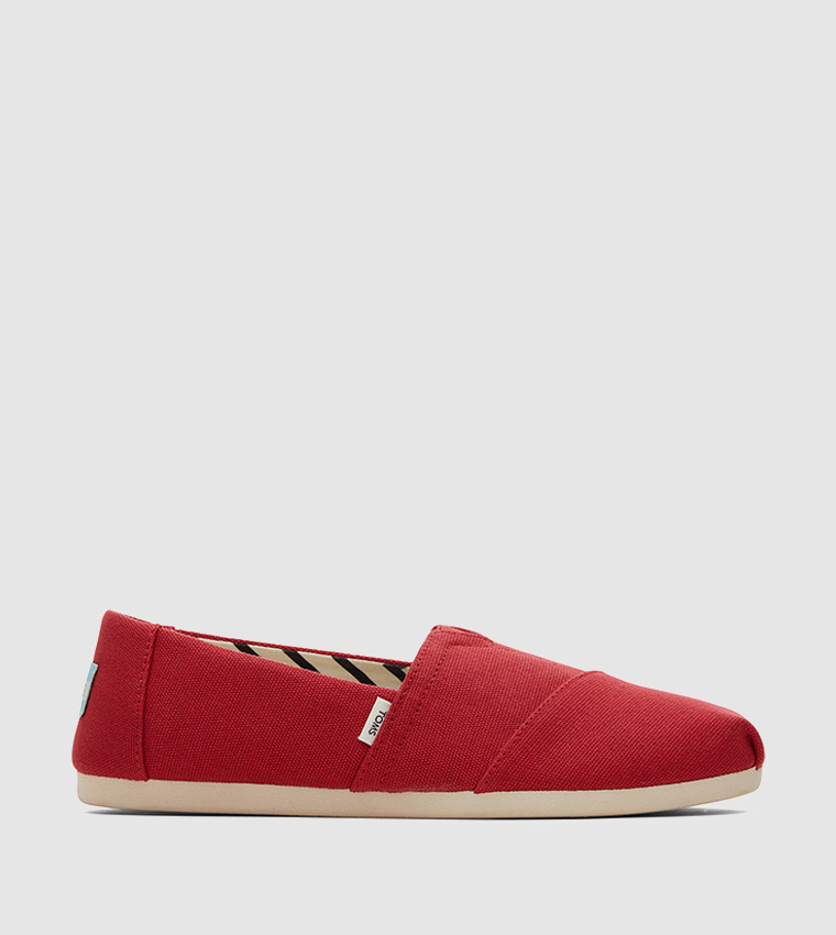 Toms slip on on sale sneakers