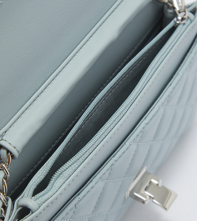 Buy Charles & Keith Quilted Flip Lock Clutch Blue In Blue