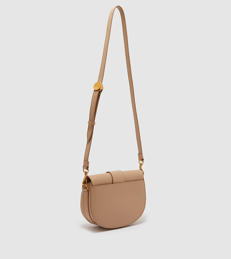 Buy Charles & Keith Amelia Metallic Push Lock Crossbody Bag In Beige |  6thStreet Bahrain