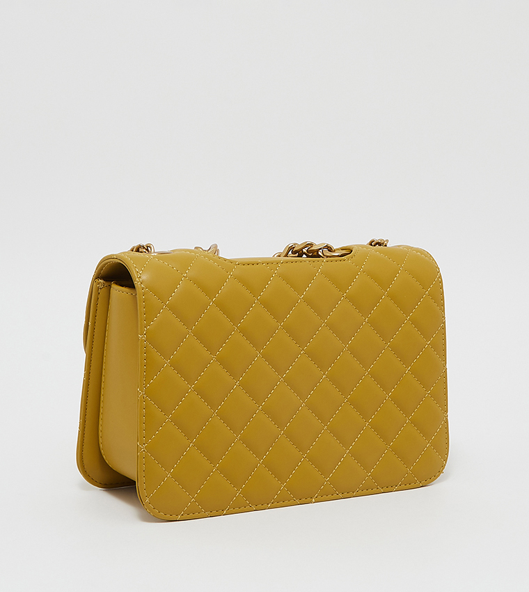 Buy Charles & Keith Chain Detailed Quilted Sling Bag In Yellow