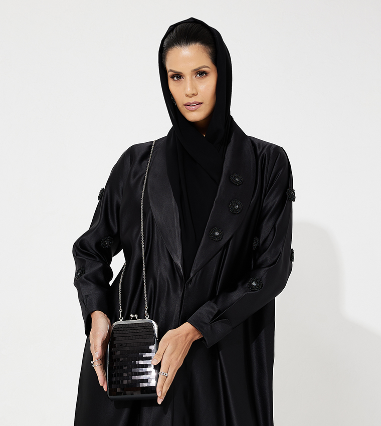 Disc Embellished Clutch Bag