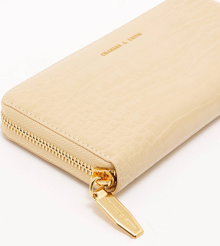 Buy Charles Keith Croc Textured Zip Around Wallet In Beige 6thStreet Bahrain