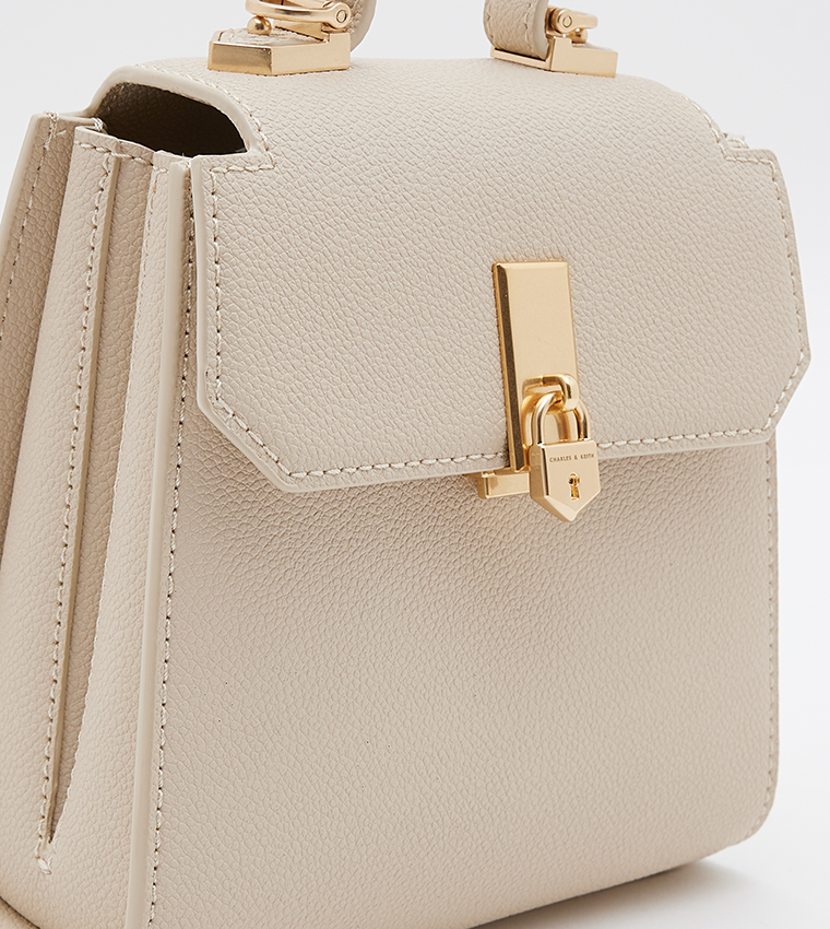 Charles and keith hot sale beige bag