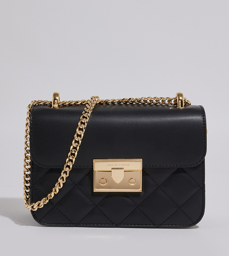 Quilted push lock online bag