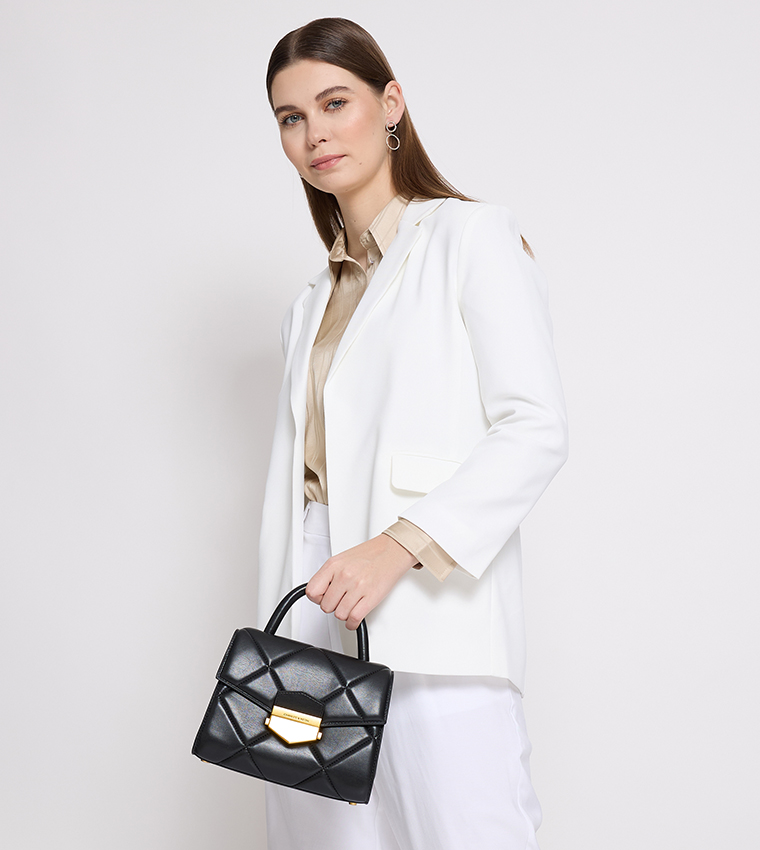 VERTIGO Quilted Trapeze Top Handle Bag