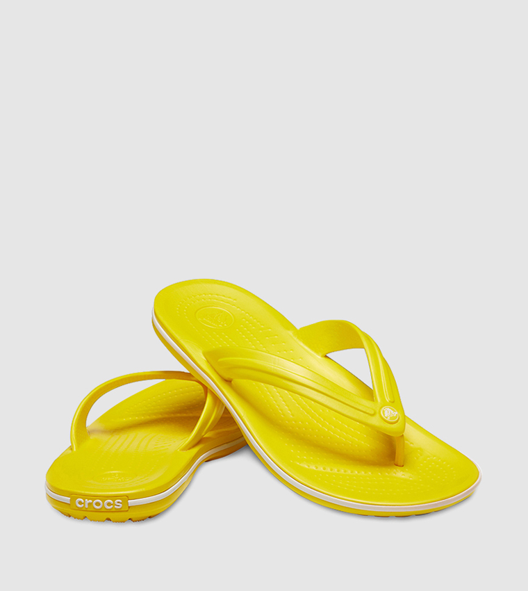 Yellow croc flip flops hot sale