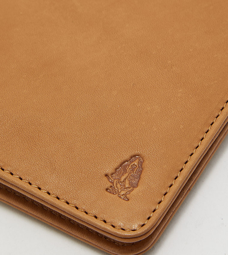 Buy hush puppies elliot ns card holder tan in tan 6thstreet qatar