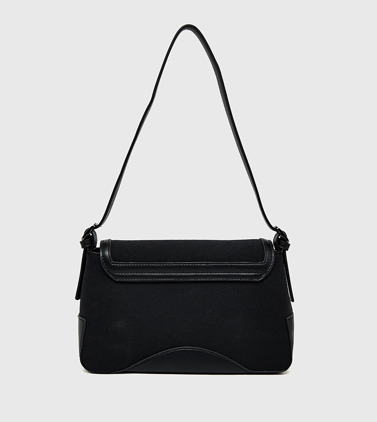 شنطة كتف نسائية فلاب بحواف متباينة 