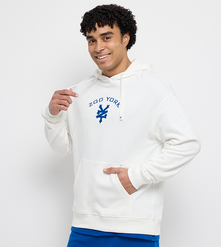 هودي اوفرسايز كم طويل بطبعة شعار 