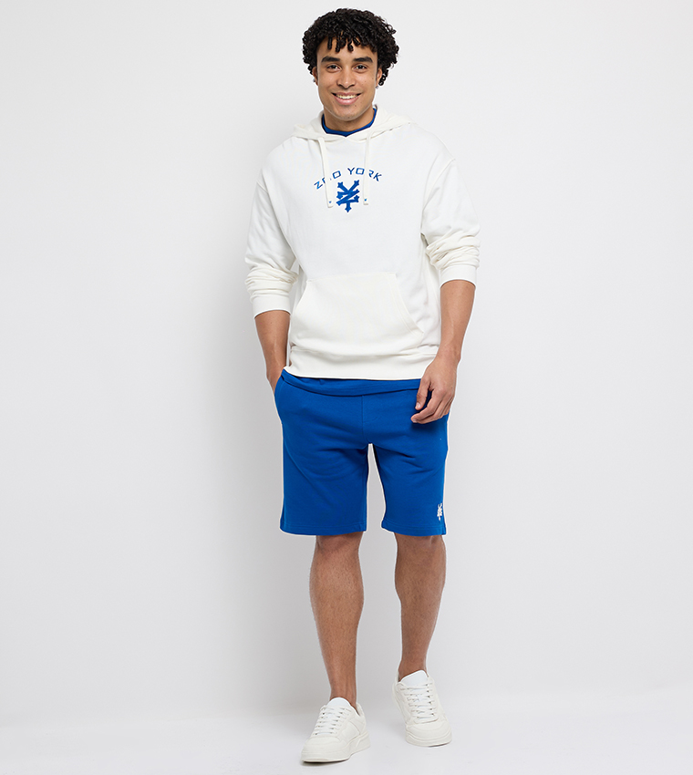 هودي اوفرسايز كم طويل بطبعة شعار 