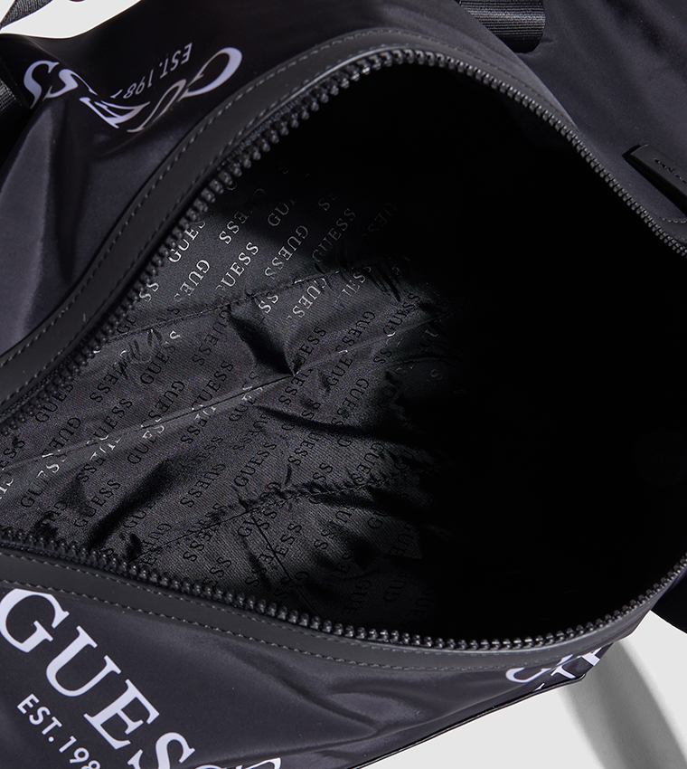 Buy Guess All Over Logo Duffel Bag In Black 6thStreet UAE