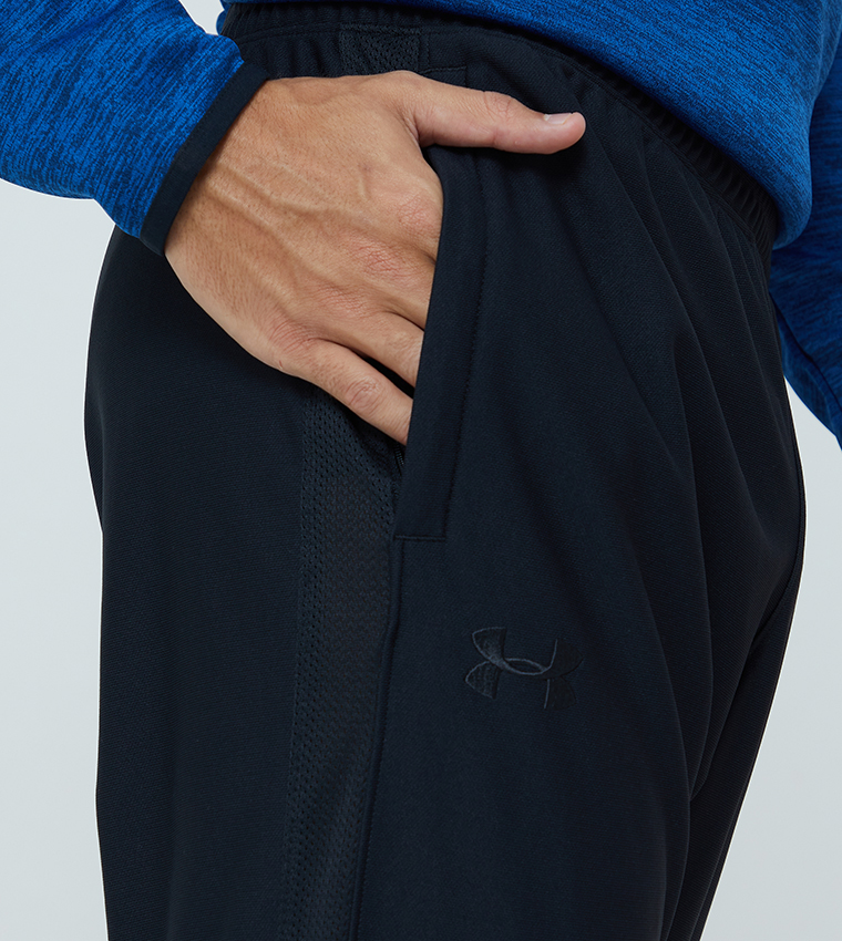Under Armour sportstyle pique track pants in black