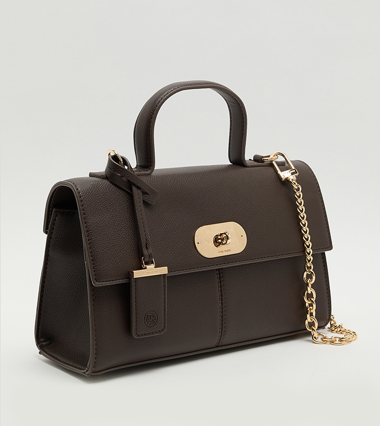 شنطة نسائية بقفل دوّار