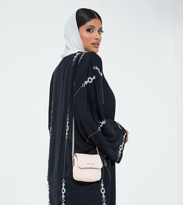 Crescent Mini Flap Crossbody Bag