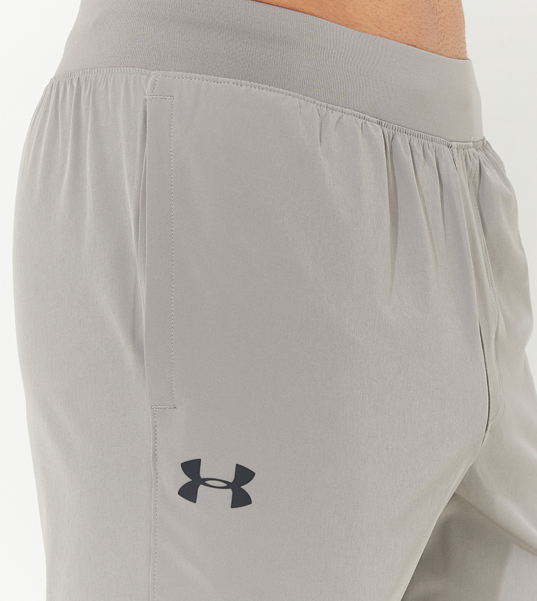 Buy Under Armour UA Stretch Woven Track Pants In Grey