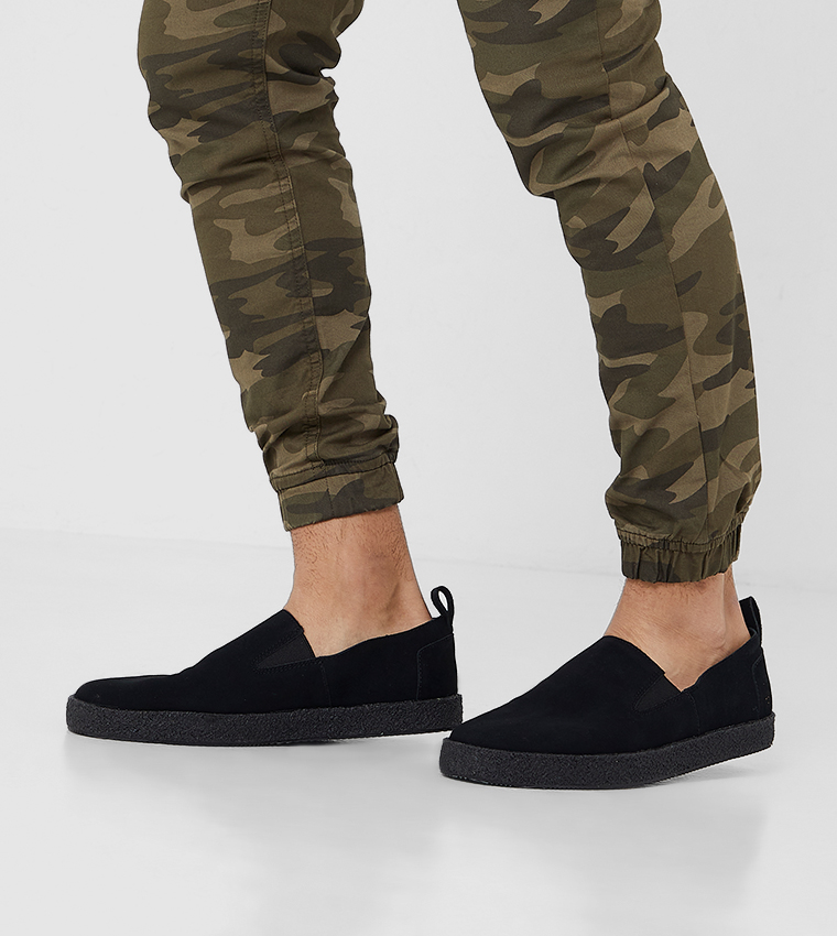Buy Toms Lowden Slip On In Black | 6thstreet Oman