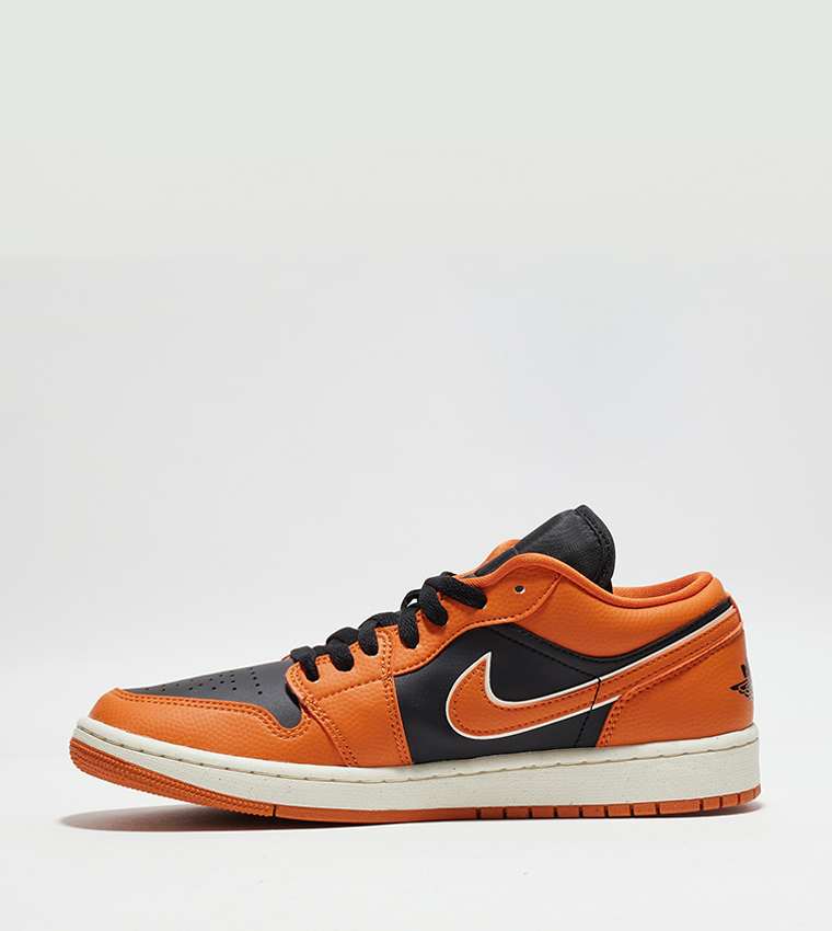 Buy Nike Air Jordan 1 Low Top Sneakers In Orange 6thstreet Saudi Arabia