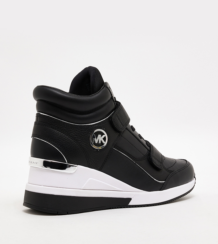 Michael kors black 2024 high top sneakers