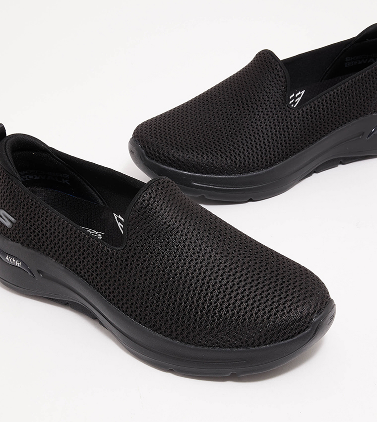 Buy Skechers GO WALK ARCH FIT Slip On Shoes In Black | 6thStreet Saudi ...