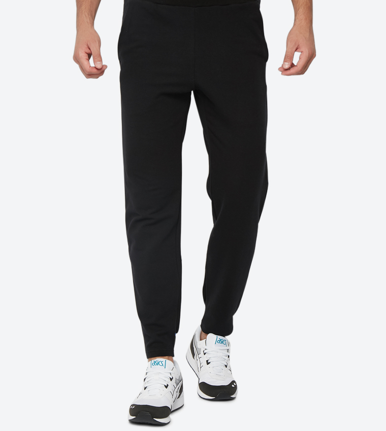 Buy Asics Tiger Stripe Detailed Elastic Wrist Joggers Black 2191A116 In Black 6thStreet Qatar