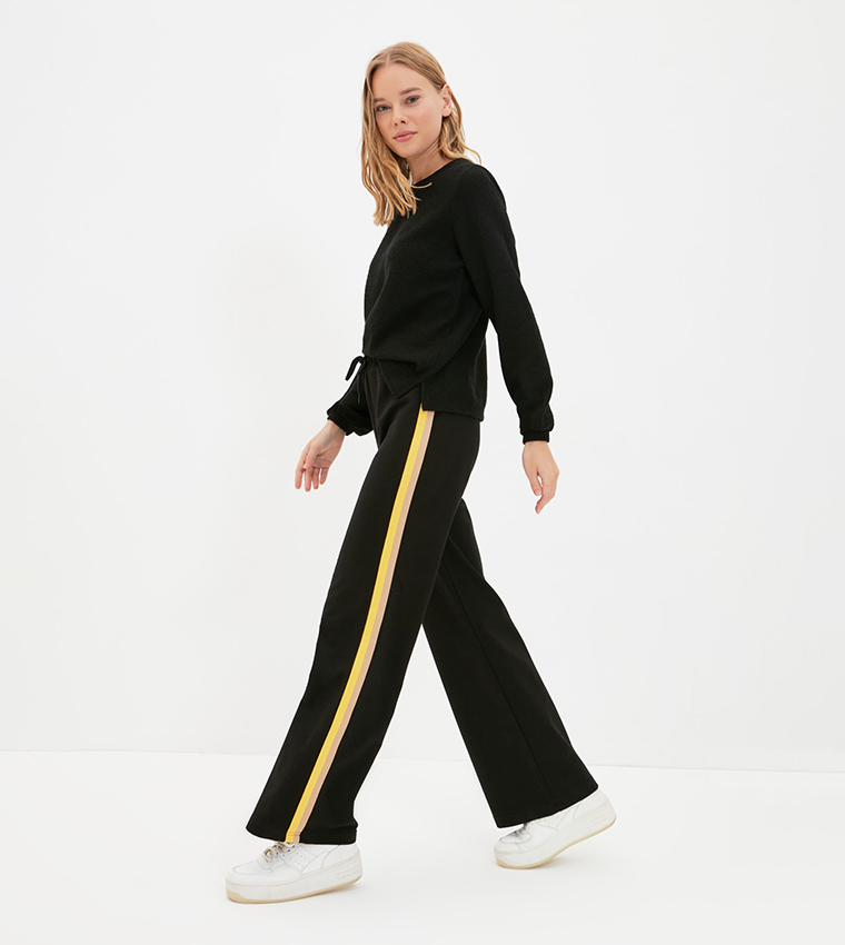 Black sweats with red stripe cheap