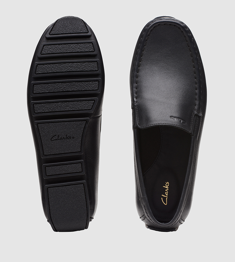 Buy Clarks Oswick Plain Slip On Loafers In Black 6thStreet Saudi Arabia