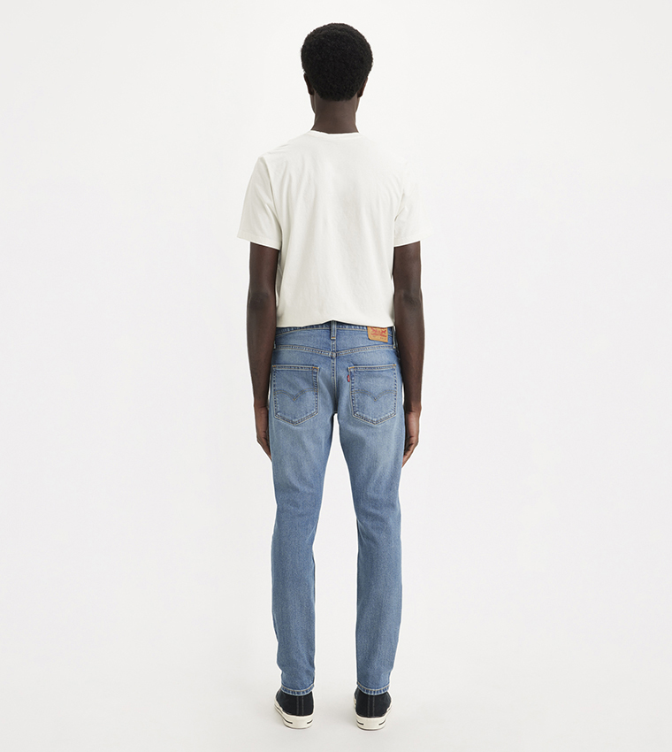512™ Mid Tapered Jeans