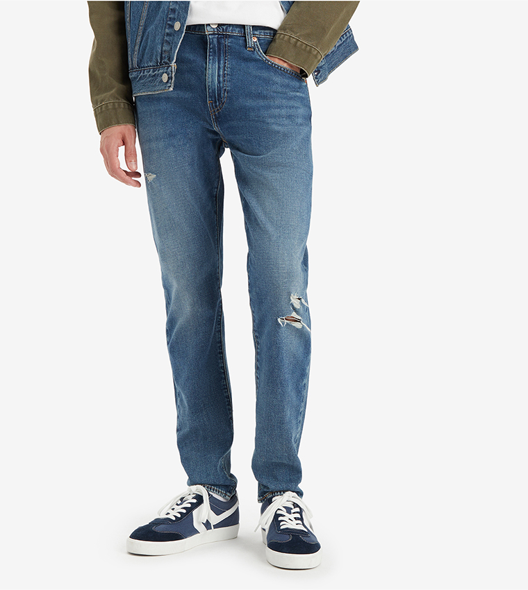 512™ Mid Tapered Jeans