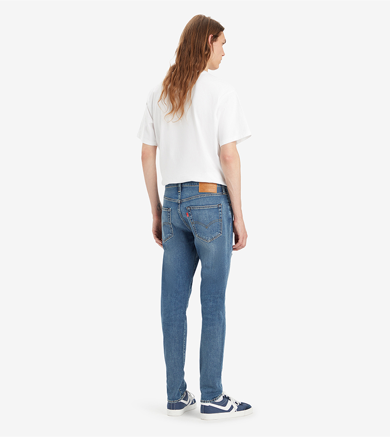 512™ Mid Tapered Jeans