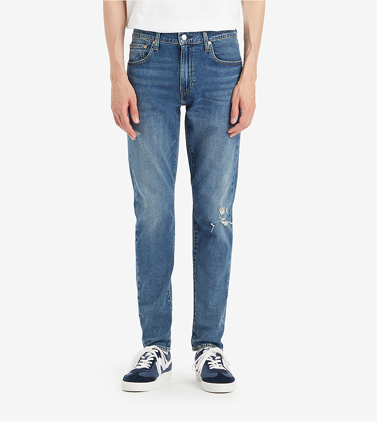 512™ Mid Tapered Jeans
