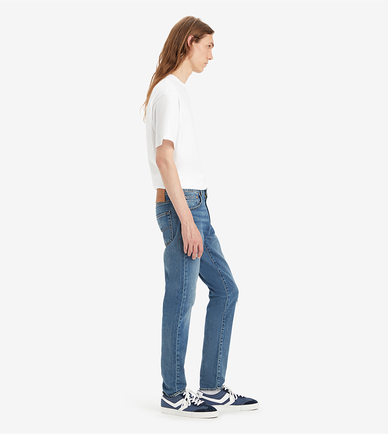512™ Mid Tapered Jeans