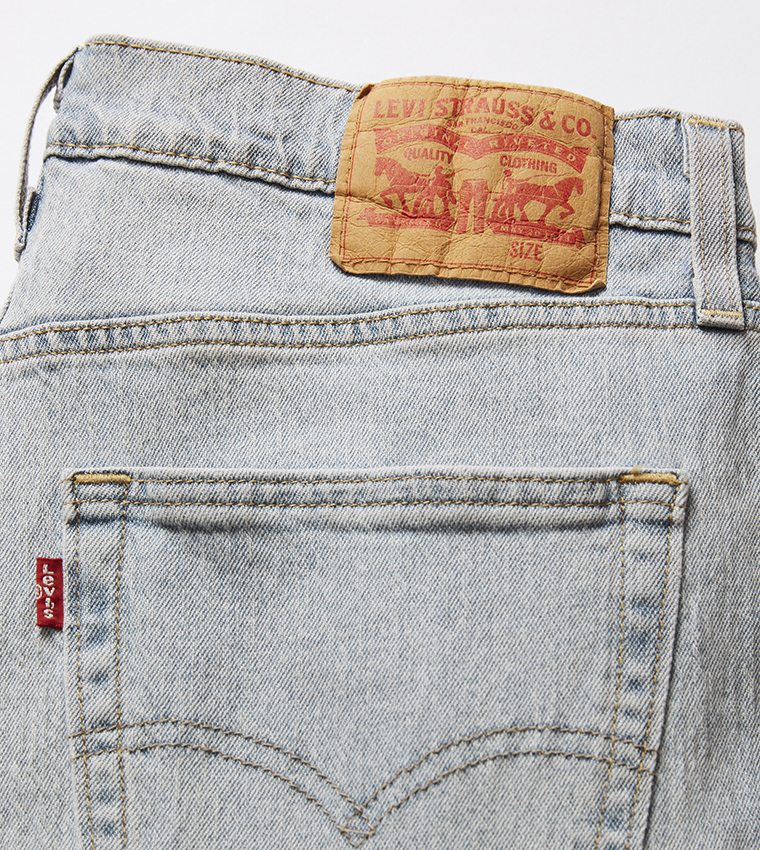 512™ Mid Tapered Jeans