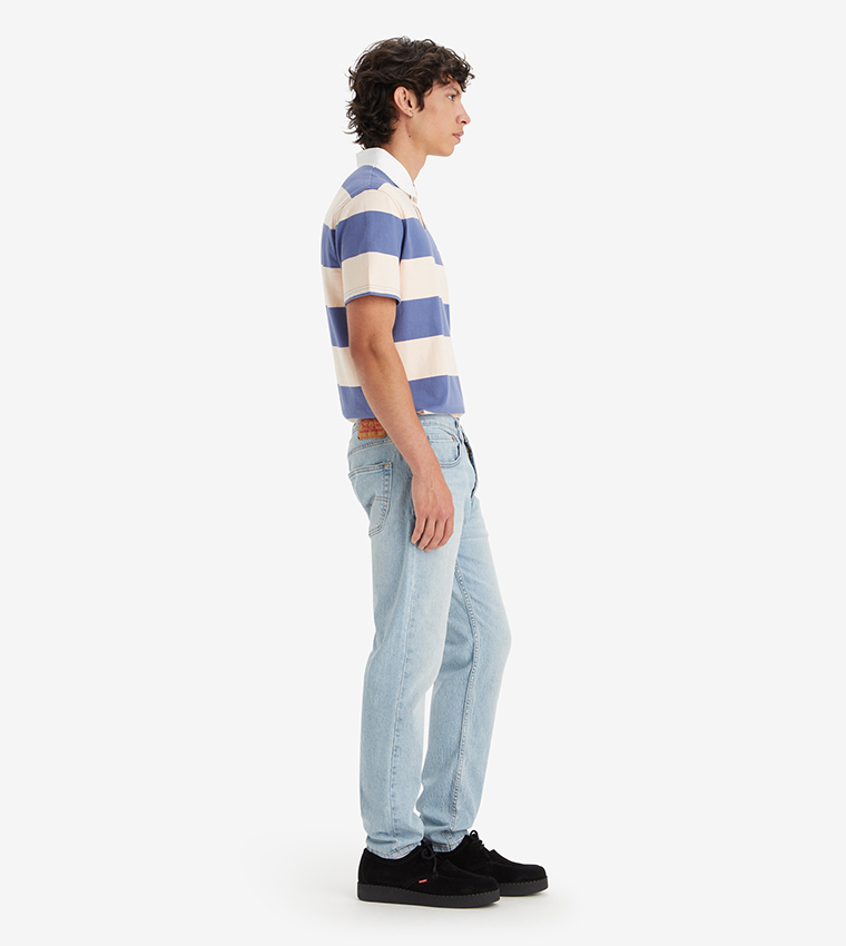 512™ Mid Tapered Jeans