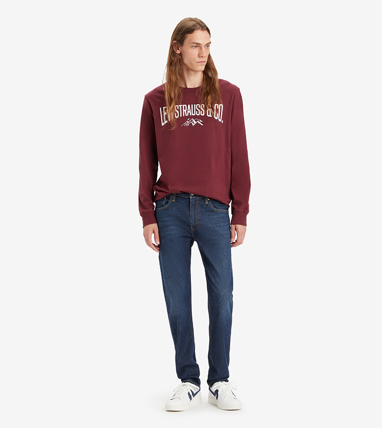 512™ Mid Tapered Jeans