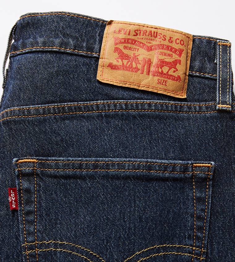 512™ Mid Tapered Jeans