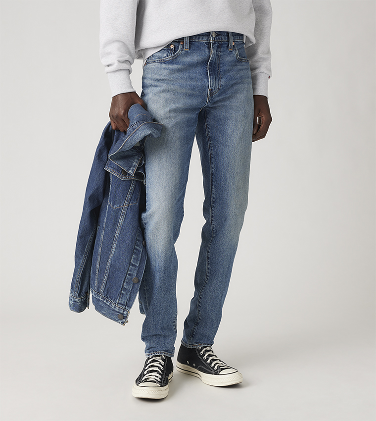 512™ Faded Slim Tapered Fit Jeans