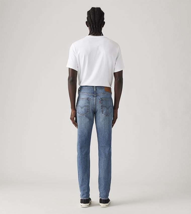 512™ Faded Slim Tapered Fit Jeans