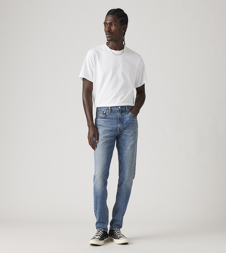 512™ Faded Slim Tapered Fit Jeans